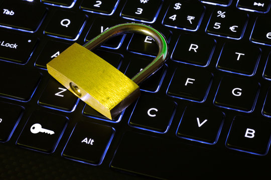 Closed lock and key button on a computer keyboard