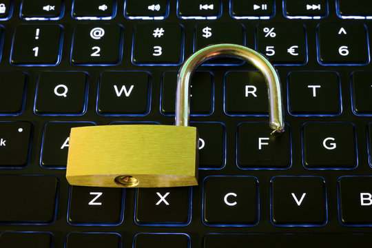 Open security lock on backlit computer keyboard