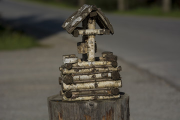 Garden decoration shaped as fountain on soft background