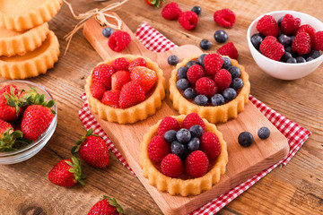 Tartlets with forest fruits. 