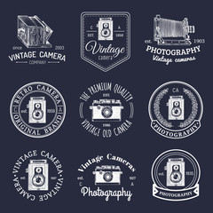 Vector set of old cameras logos. Vintage photo studio, salon signs, labels or badges.