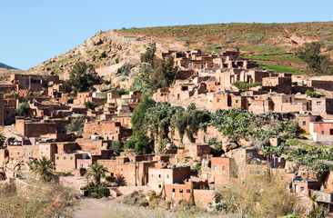 Fototapeta na wymiar Traditional conservative berber village in Atlas mountains, Morocco