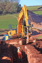 Digger digging a trench