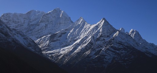 Fototapeta premium Khusum Khangaru and other high mountains in the Everest National Park. View from Namche Bazar.