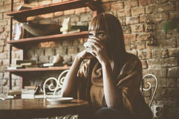 Woman enjoying in coffee.