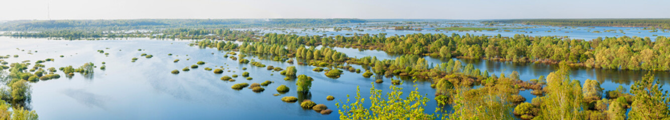 View from high bank on annual spring overflow of Desna River panorama. Novgorod-Siversky, Ukraine.
