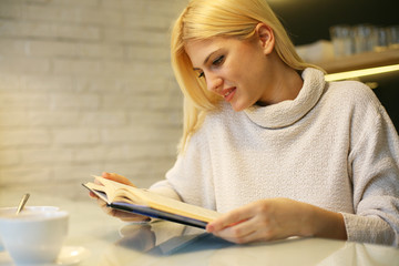 Woman reading a book.