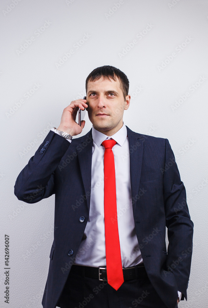 Wall mural A man in a business sui