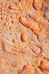 Orange stone with holes 