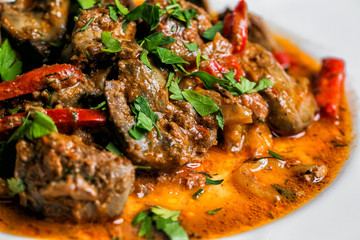 Roasted meat and vegetables. selective focus on the filling close-up.
