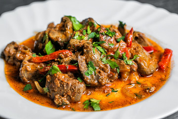 Roasted meat and vegetables. selective focus on the filling close-up.