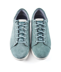 Pair of man's shoes top view. Suede sneakers isolated on white background.