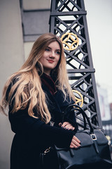 young girl waiting for the fall of the city