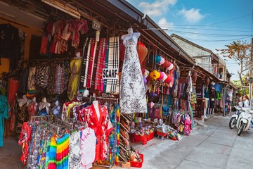 HOI AN, VIETNAM - MARCH 15, 2017: Fashion shops located on main street in Hoi An Ancient Town, Vietnam. Hoi An is Vietnam most atmospheric and delightful town.