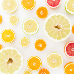 Lemon, orange, mandarin, grapefruit and sweetie on white background. Flat lay, top view.