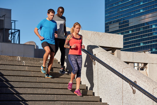 Diverse Group Of People Working Out In The City