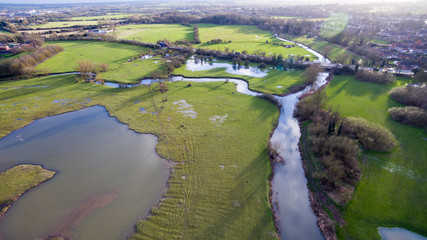 Aerial view of a lake and river in the countryside