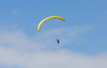 Paraglider flying against the mountain Lhotse (8516 m) - Everest region, Nepal, Himalayas