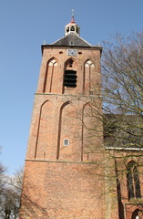 Fototapeta na wymiar Tower of the Hippolytus Church from the 15th century in Middelstum. The Netherlands