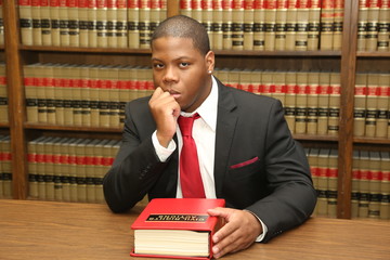 Young African American Lawyer in Law Library