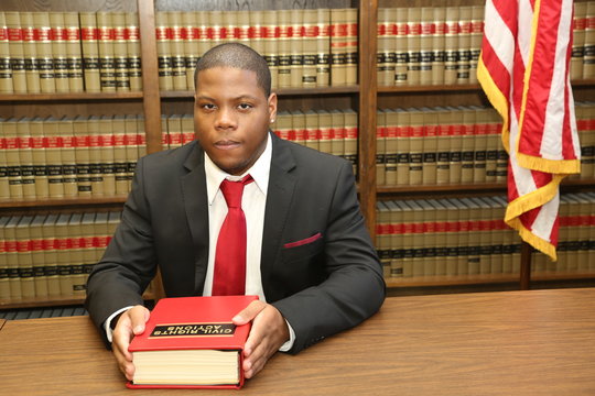 Young African American Lawyer in Law Library, civil rights, equality, social justice