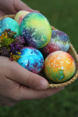 Toddlers hands holding easter eggs