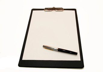 A white sheet of paper with a pen mounted on a folder