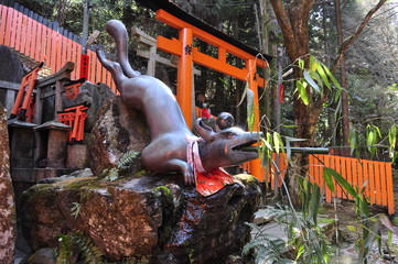 Kitsune Fox Statue Water fountain in Fushimi Inari Shrine - Kyoto, Japan