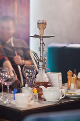 The restaurant's interior with hookah