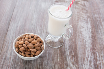 Bowl of Almonds and Glass of Almond Milk