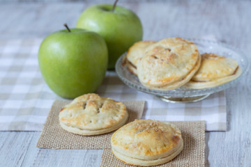 Green Apples With Hand Pies Close Up