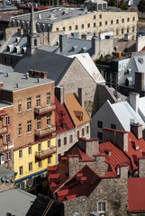 Looking down at the Coloured buildings of Old Quebec with a view to the distance
