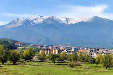 Beautiful view of the Bansko. Snow covered peaks of the Pirin mountains on background - Pirin National Park, Bulgaria - 142716288