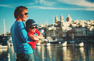 father and son looking at city of Valetta, Malta