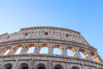 Fototapeta premium Italy, Rome, a fragment of the wall of the Colosseum. Windows, set, sun