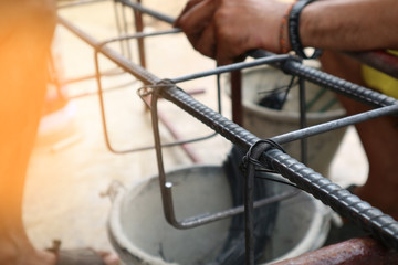 hands of builder worker wires