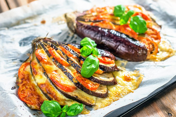 Italian traditional dish with eggplant, tomato and mozzarella
