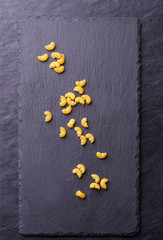 raw pasta on a board