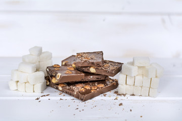 Chocolate pieces and white sugar. Calories in chocolate  are extra-fattening
