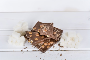 Chocolate pieces and white sugar. Calories in chocolate  are extra-fattening