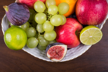 Assortment fruits on wooden table