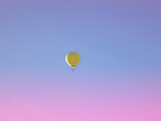 Background with sky and balloon. Toned. Travel concept.