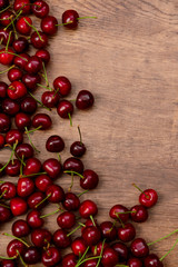 Cherries on wooden table