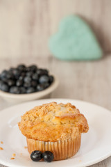 Blueberry Muffin With Heart In Background Close Up