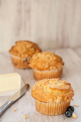 Blueberry Muffins with Butter and Knife