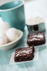 Brownies with Eggs and Flour and a Coffee Cup