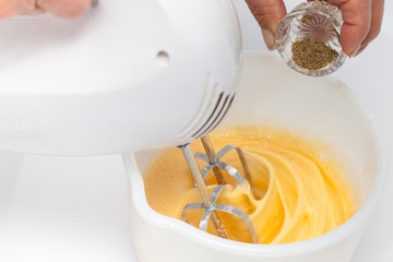 Omelet preparation : Whisking eggs and adding ingredients