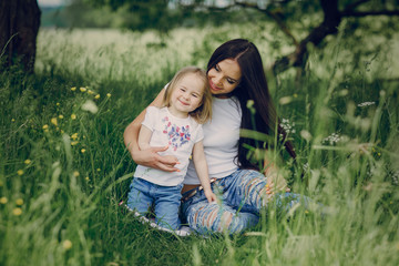 Fototapeta premium child near tree with mom
