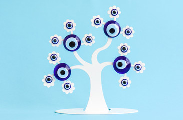 Tree of amulet.Turkish nazar, blue evil eye glass. 