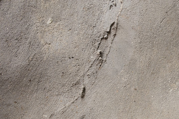 Cracked cement wall, abstract texture background